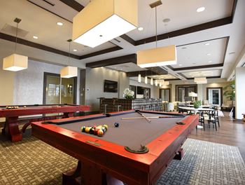 Clubroom with billiards, flatscreen tv, wi-fi, seating areas and bar